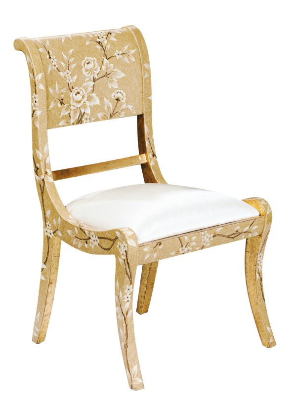White floral design painted on chair. 